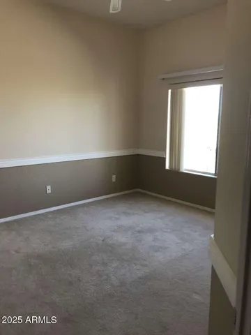 an empty room that has a window