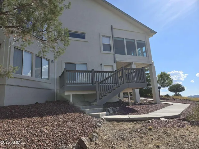 a view of a two chairs in the roof deck