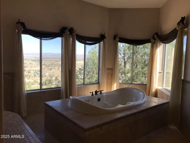 a bathroom with a glass door