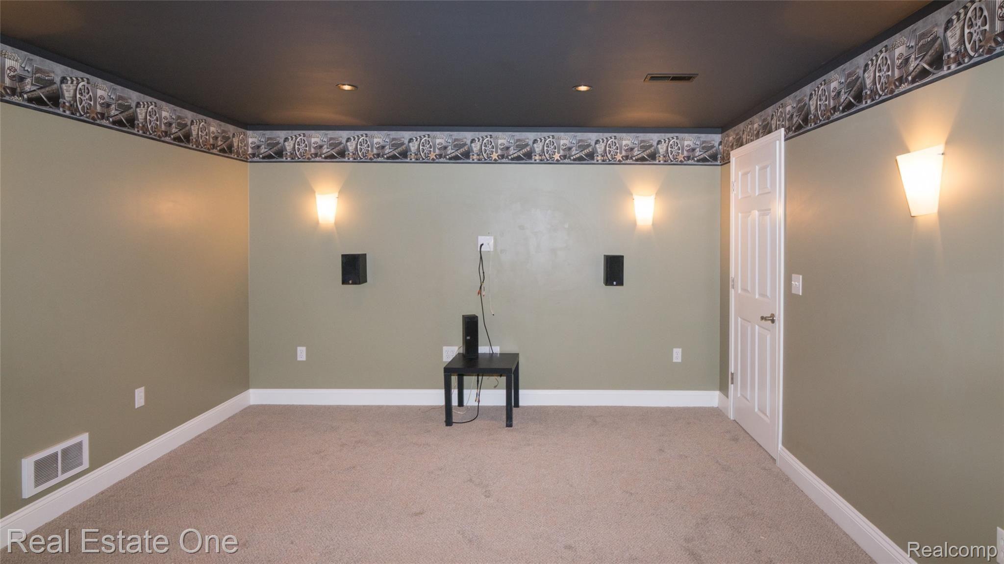 2631 Clivedon Road Howell, MI 48843 - Photo 31 of 32 watch your favorite movies in your own home theatre!