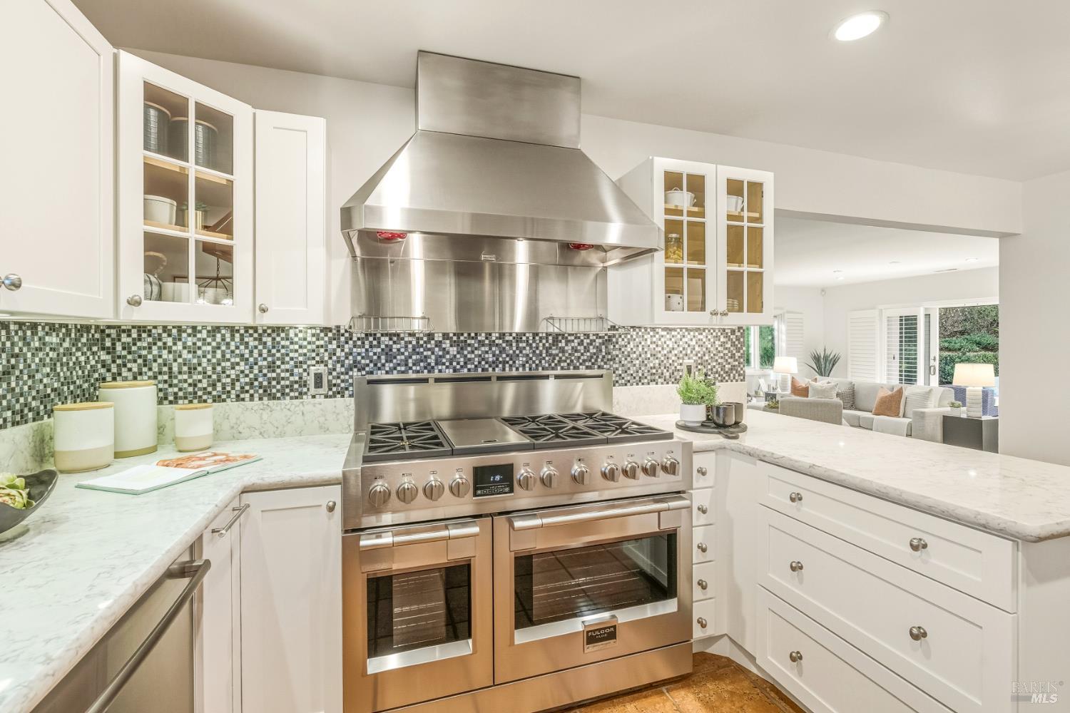 829 Las Pavadas Avenue San Rafael, CA 94903 - Photo 19 of 55 Glass tile backsplash, professional stainless hood and solid wood cabinets...