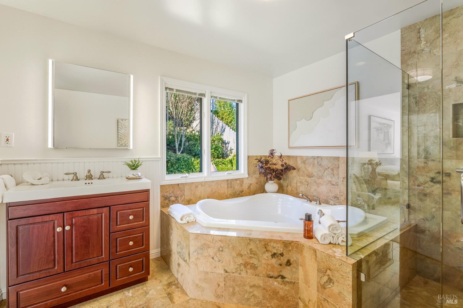 829 Las Pavadas Avenue San Rafael, CA 94903 - Photo 36 of 55 Large primary bath with quartz-topped vanity, granite tile and jet soaking tub...