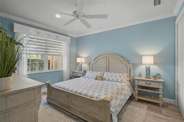 a bathroom with a toilet a sink a mirror and a shower