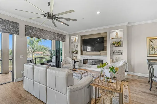 a view of a living room and a wooden floor