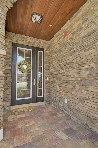 a view of living room with furniture and flat screen tv