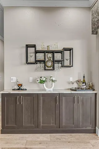 a bedroom with a large bed and a tv