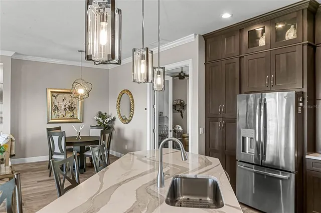 a close view of a sink a faucet a faucet and a shower in a bathroom
