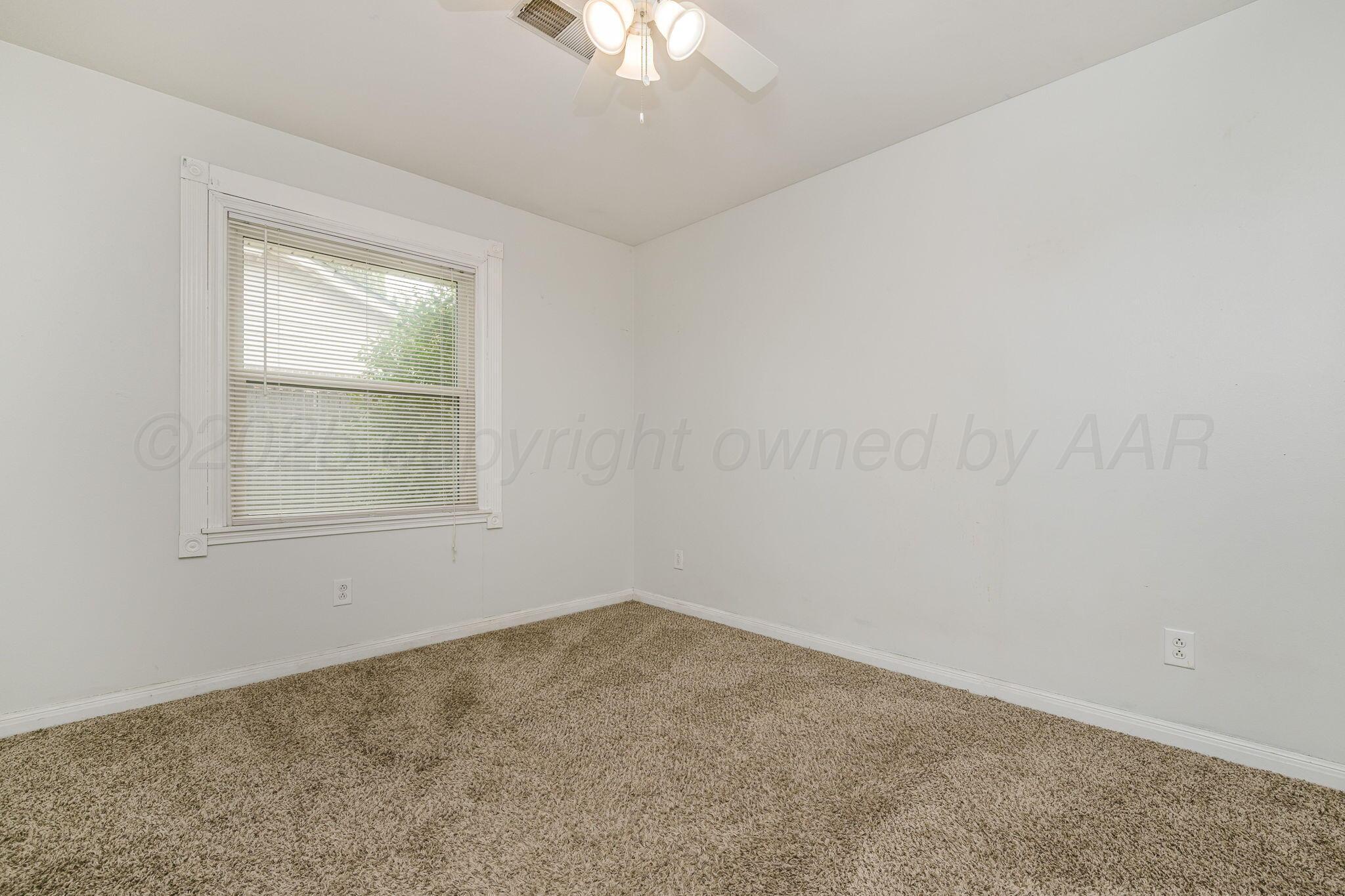 5507 Randolph Road Amarillo, TX 79106 - Photo 14 of 20 Bedroom 3