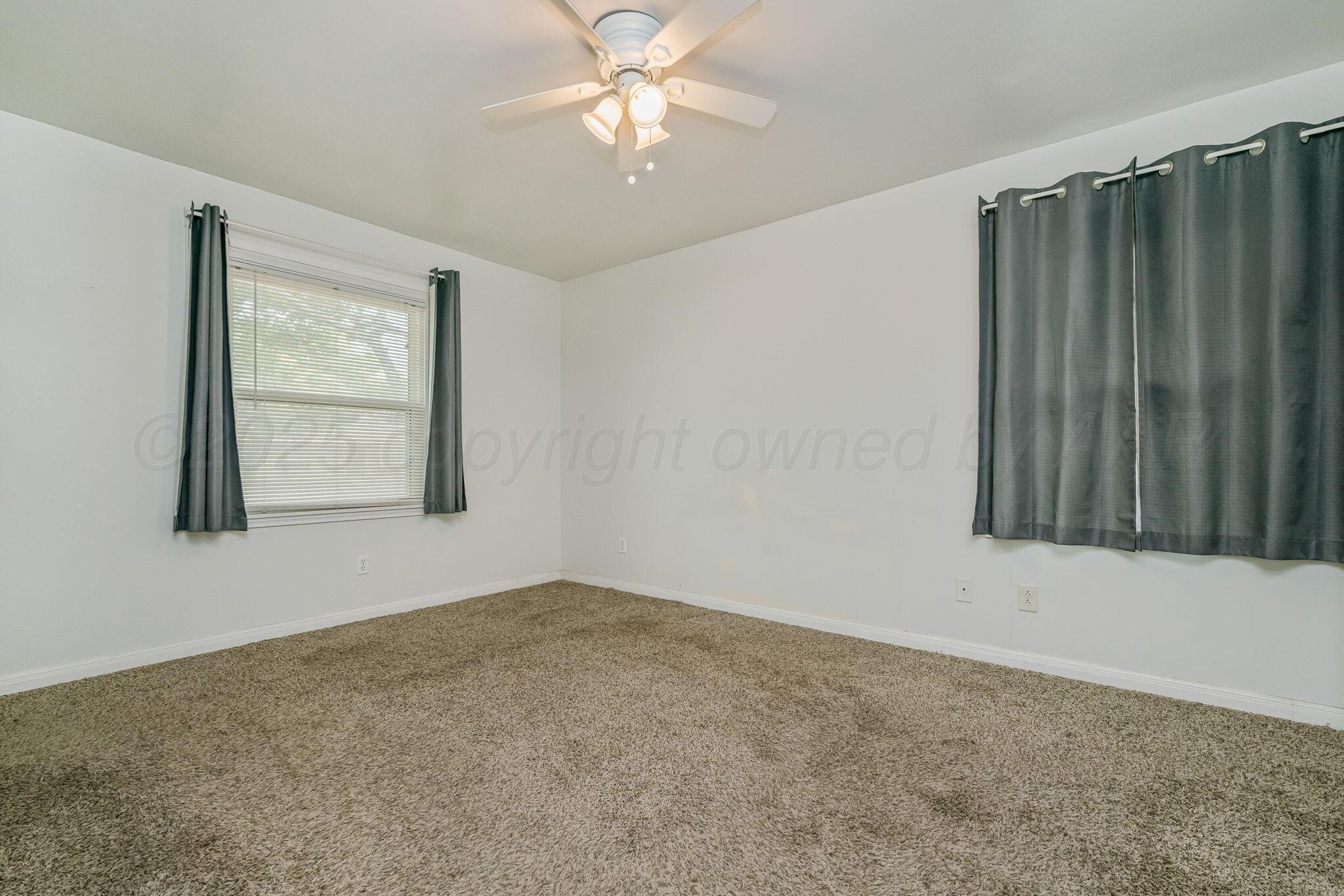 5507 Randolph Road Amarillo, TX 79106 - Photo 15 of 20 Primary Bedroom