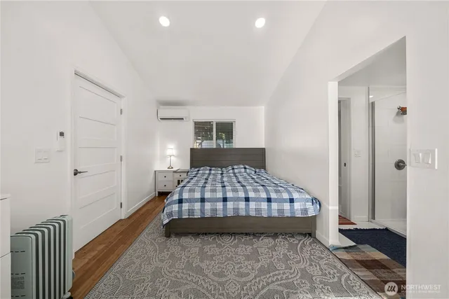 a bedroom with a bed and closet