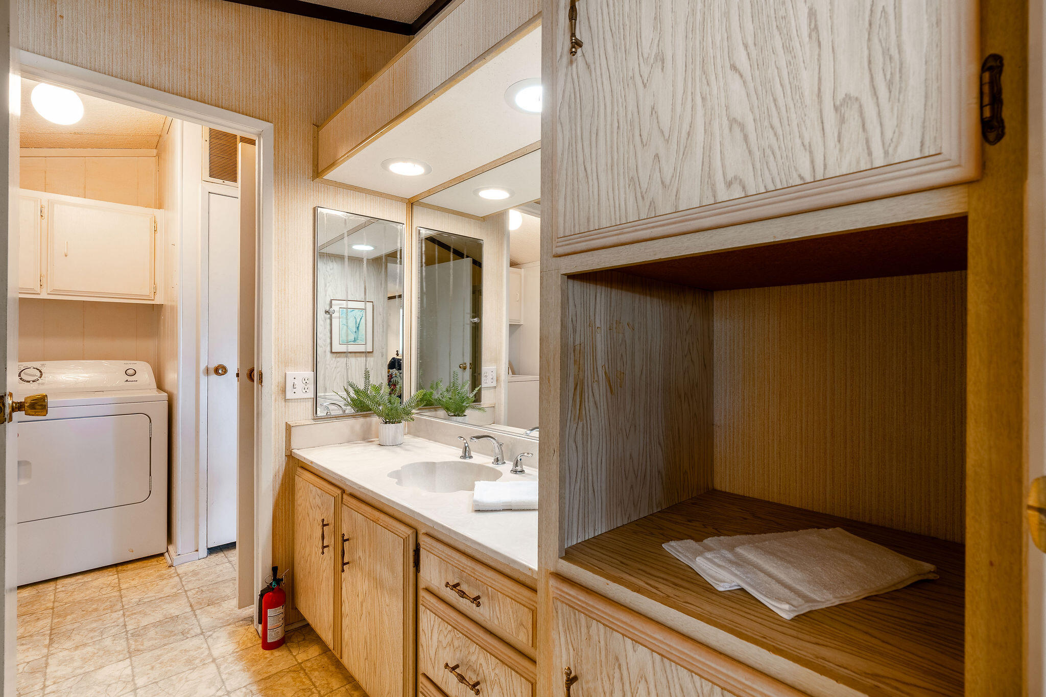 149 Capri Street Rancho Mirage, CA 92270 - Photo 22 of 50 a bathroom with a sink and a mirror