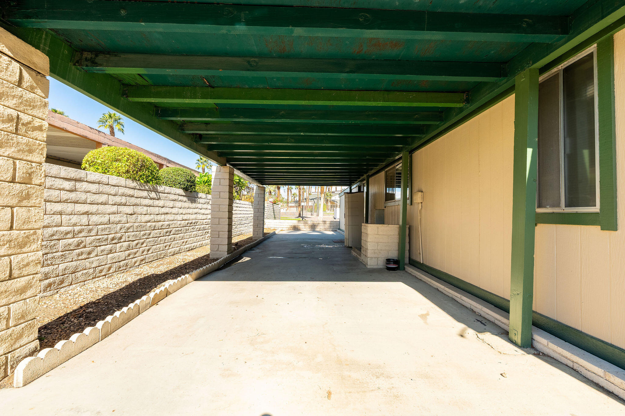 149 Capri Street Rancho Mirage, CA 92270 - Photo 29 of 50 a view of backyard with green space