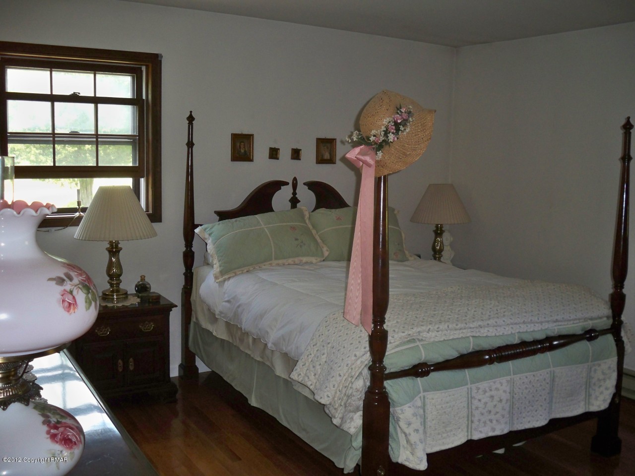 5720 Neola Road Stroudsburg, PA 18360 - Photo 13 of 16 a bed room with a bed and a window