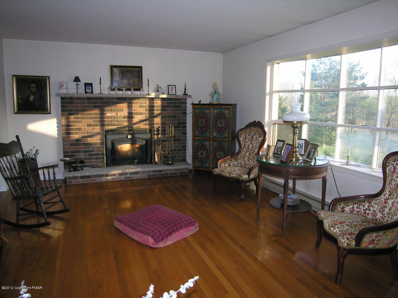 5720 Neola Road Stroudsburg, PA 18360 - Photo 3 of 16 a living room with furniture and a flat screen tv