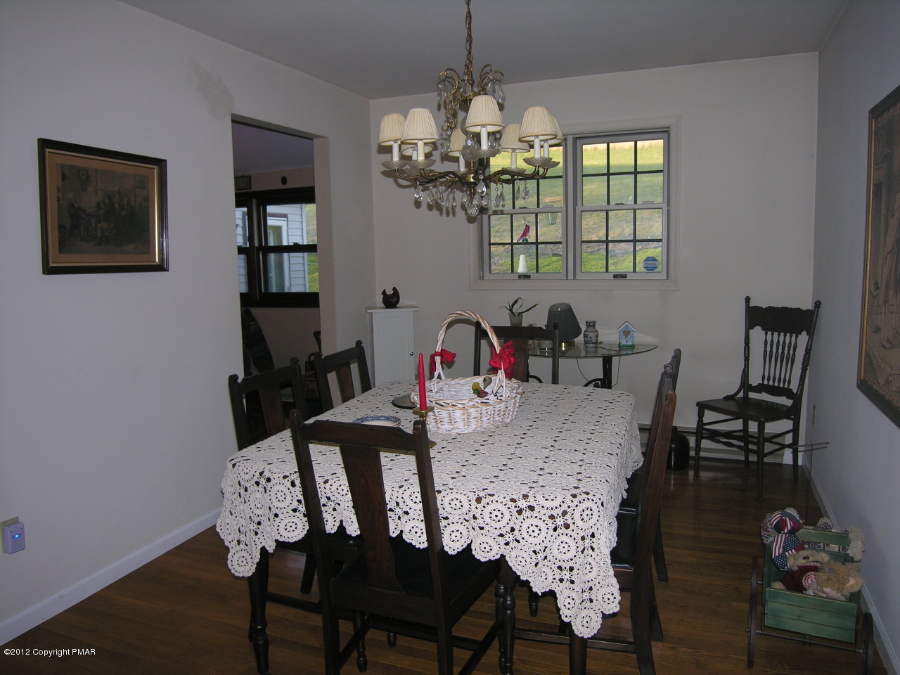5720 Neola Road Stroudsburg, PA 18360 - Photo 7 of 16 a view of a dining room with furniture and chandelier