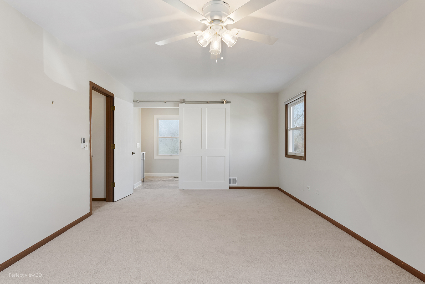 92 Foxboro Lane Gurnee, IL 60031 - Photo 15 of 46 an empty room with chandelier fan and windows