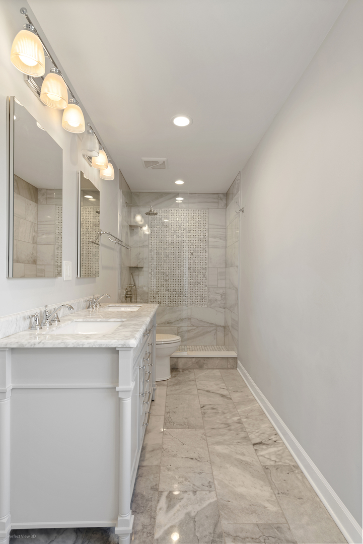 92 Foxboro Lane Gurnee, IL 60031 - Photo 17 of 46 a bathroom with a sink a toilet and mirror