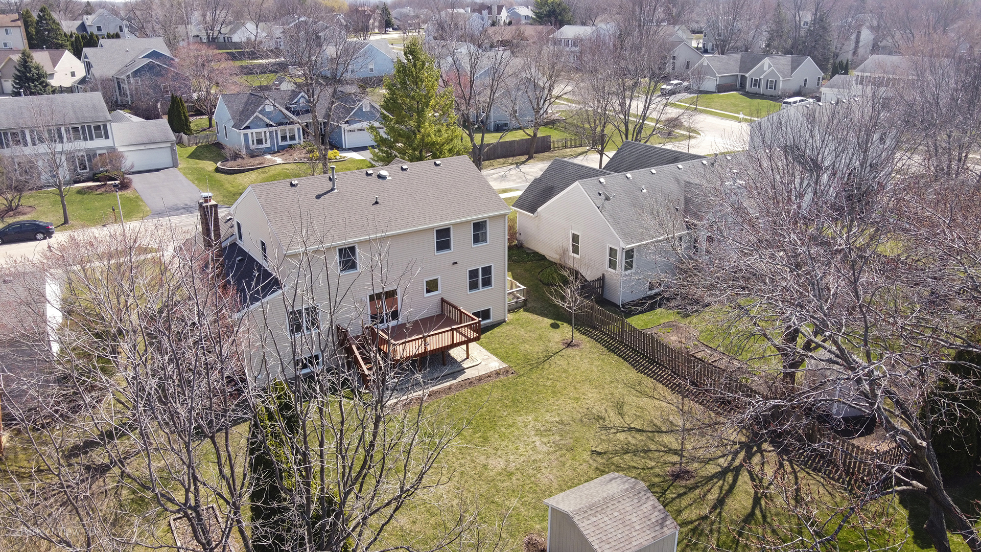 92 Foxboro Lane Gurnee, IL 60031 - Photo 30 of 46 a view of a house with a swimming pool