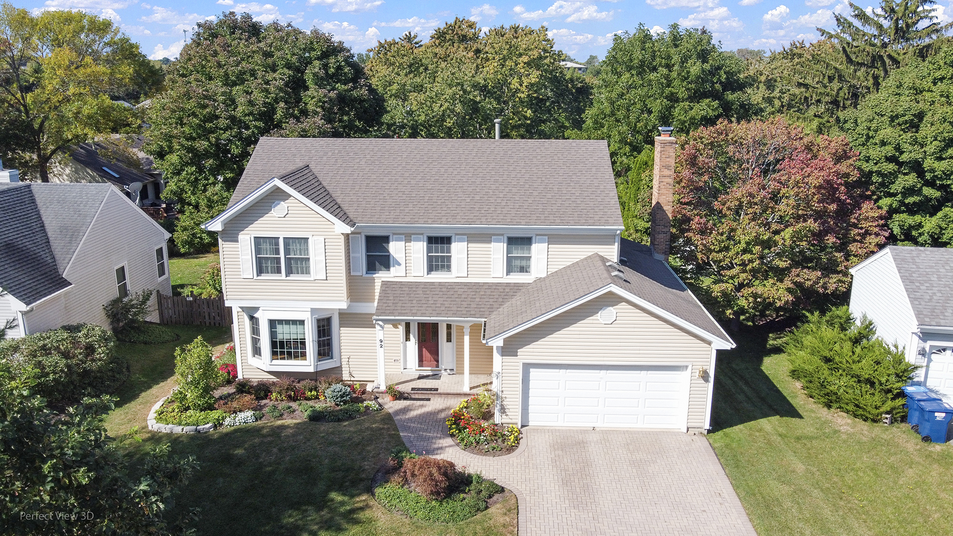 92 Foxboro Lane Gurnee, IL 60031 - Photo 36 of 46 a aerial view of a house with a yard and potted plants
