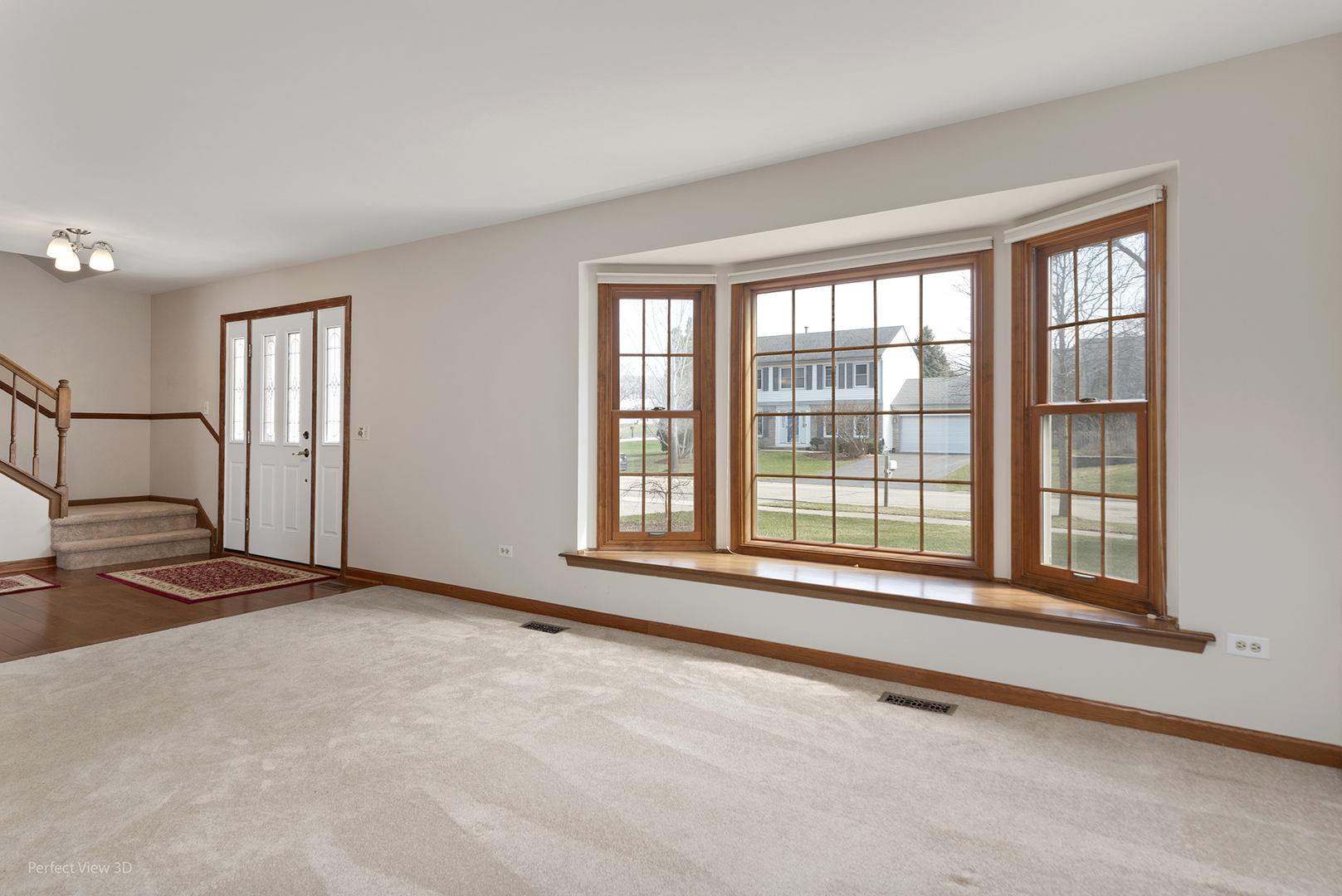 92 Foxboro Lane Gurnee, IL 60031 - Photo 5 of 46 a view of an empty room with a window