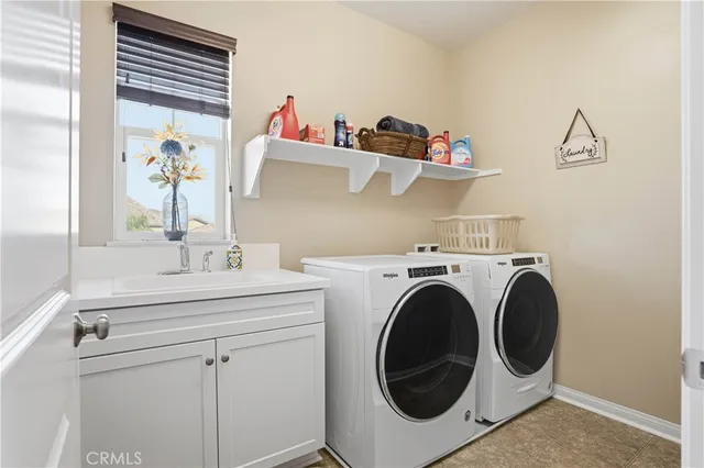 a bathroom with a sink vanity tub and shower