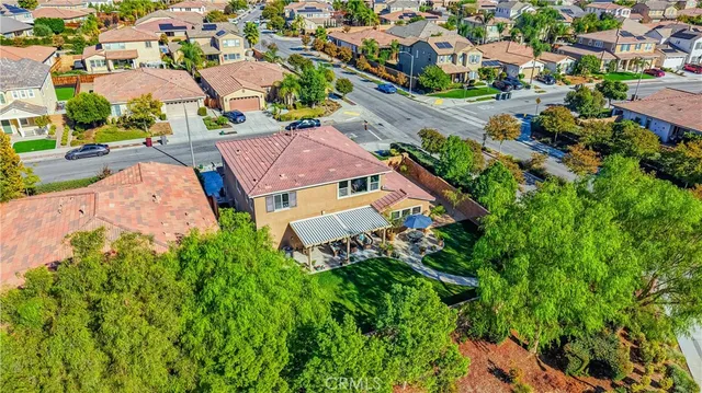a view of an house with backyard space and garden