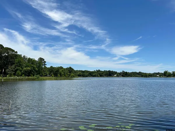 a view of outside space and a lake view