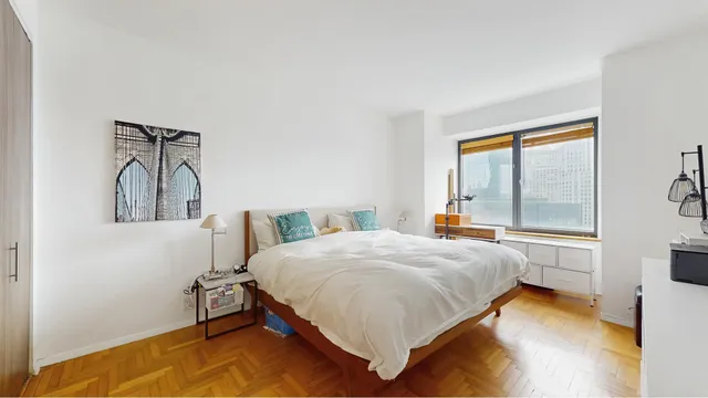 a kitchen with a refrigerator and a sink
