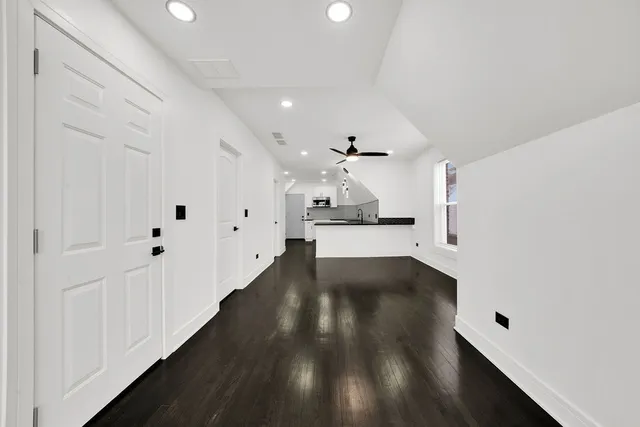a view of kitchen with wooden floor