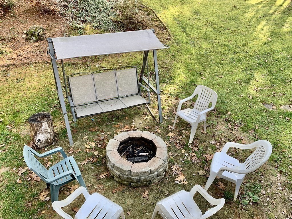 11 Hebert Road Spencer, MA 01562 - Photo 28 of 29 a view of an outdoor sitting area with furniture and garden