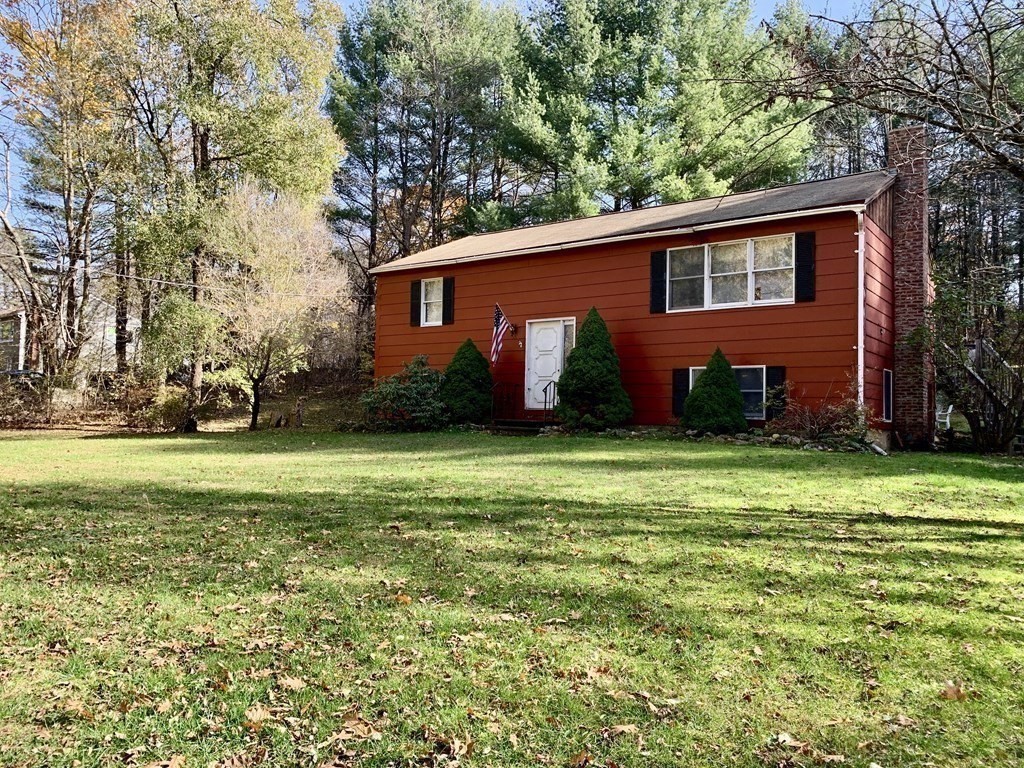 11 Hebert Road Spencer, MA 01562 - Photo 29 of 29 a view of a backyard with potted plants and large trees