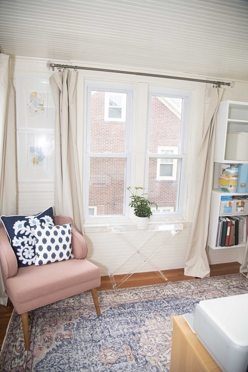 3 Chester Road, Unit 3 Belmont, MA 02478 - Photo 34 of 40 a living room with a couch and a window