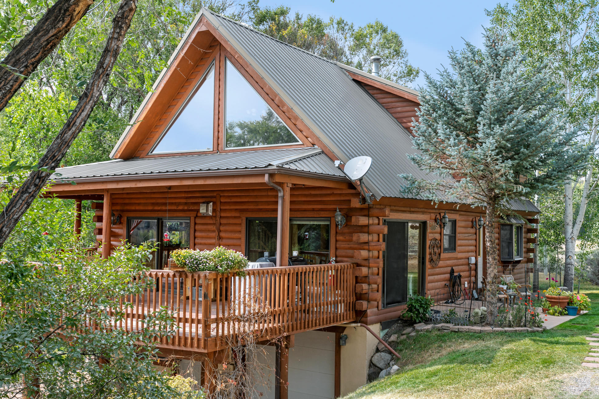 756 Eby Creek Road Eagle, CO 81631 - Photo 1 of 45 a front view of house with yard and green space