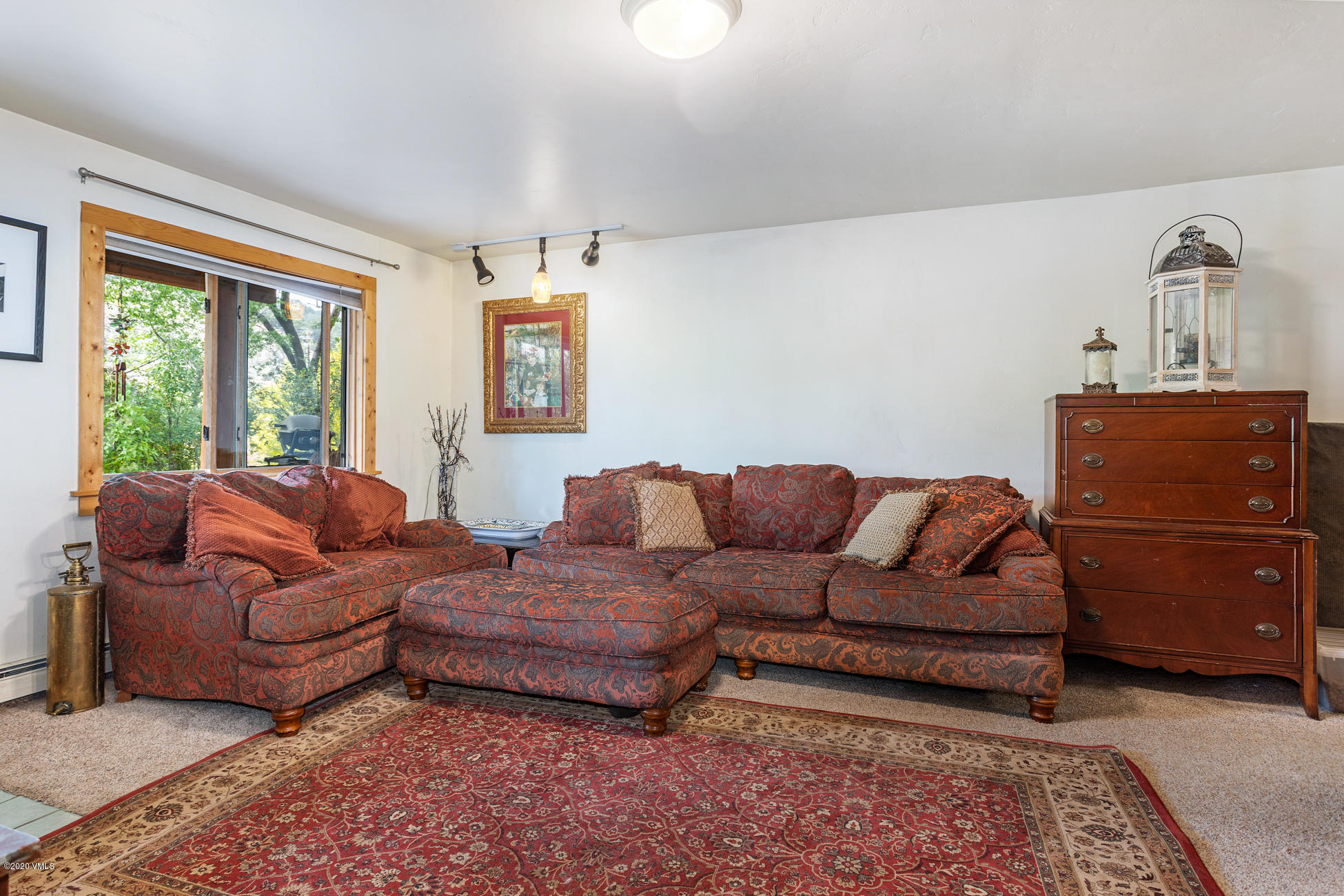 756 Eby Creek Road Eagle, CO 81631 - Photo 17 of 45 a living room with furniture and a window