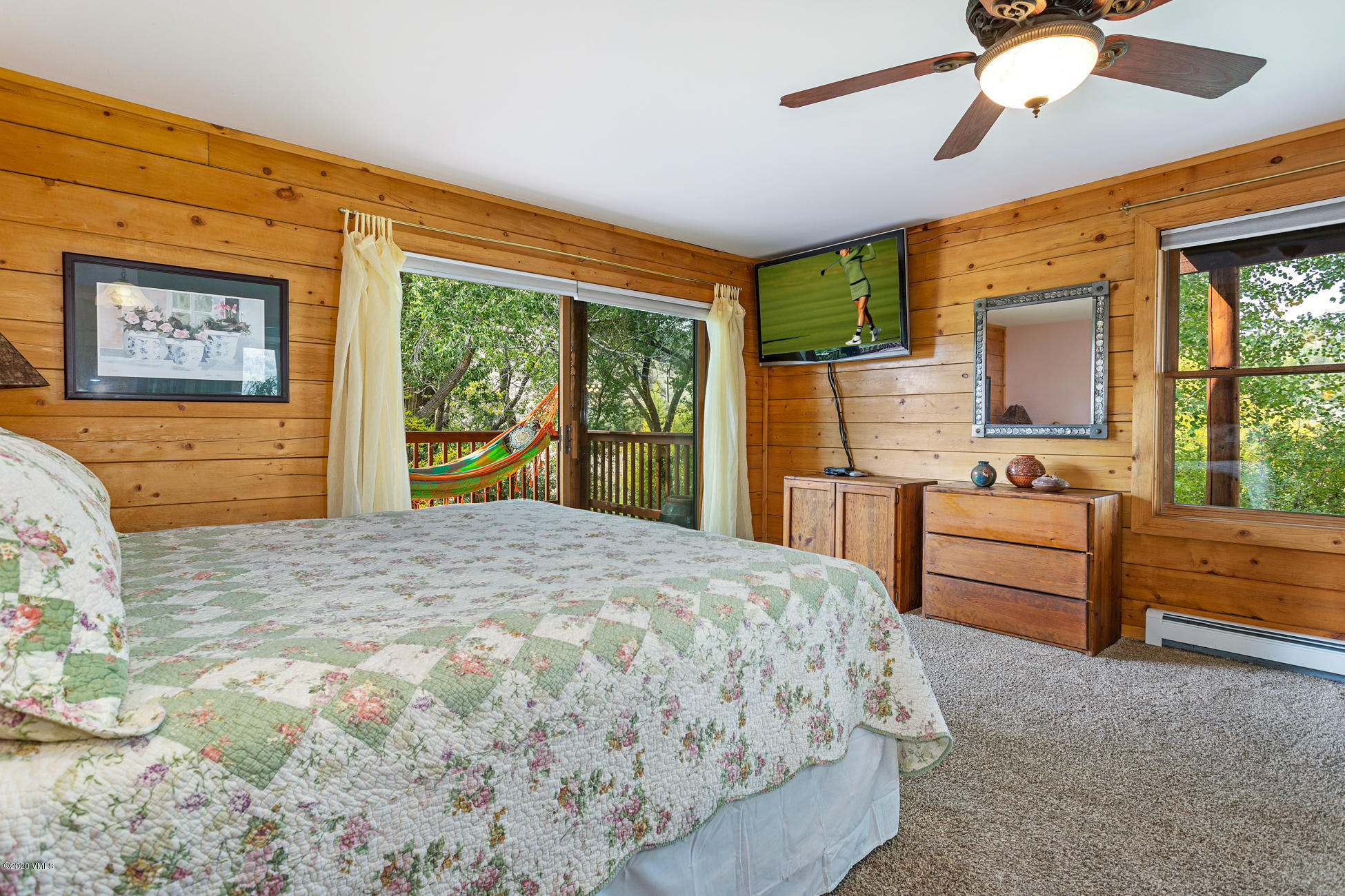 756 Eby Creek Road Eagle, CO 81631 - Photo 10 of 45 a bedroom with a bed and a dresser
