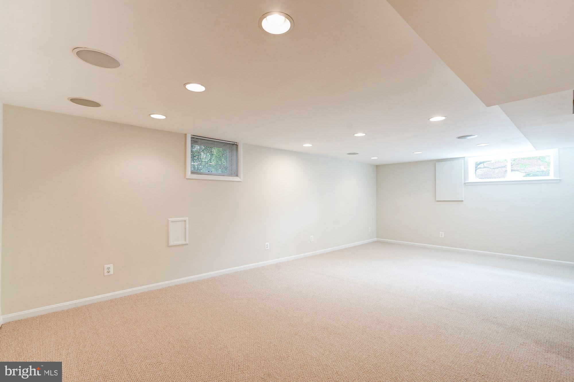 6800 Dean Drive McLean, VA 22101 - Photo 12 of 18 Basement w/ new carpet & speakers
