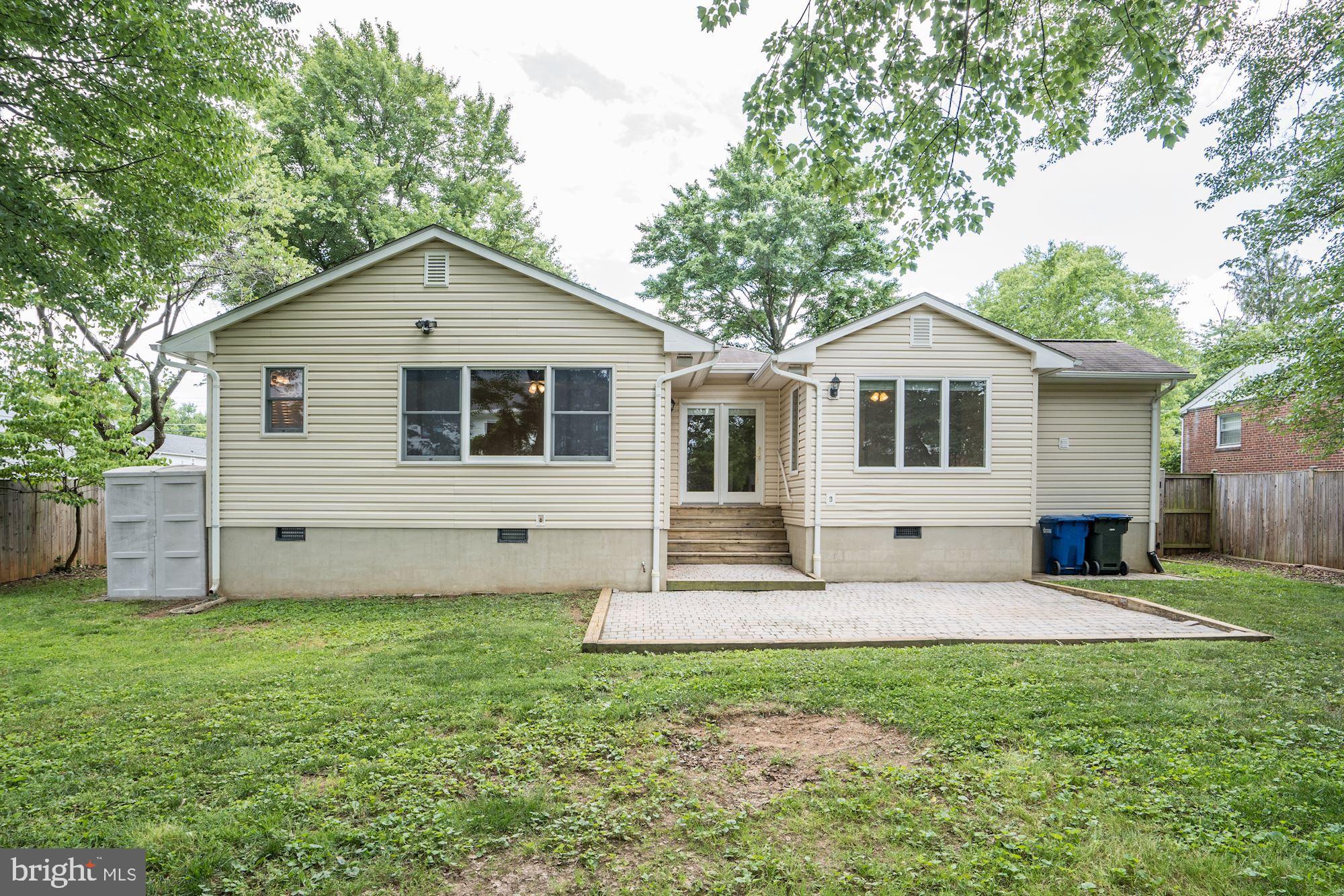 6800 Dean Drive McLean, VA 22101 - Photo 17 of 18 Private backyard w/ brick patio