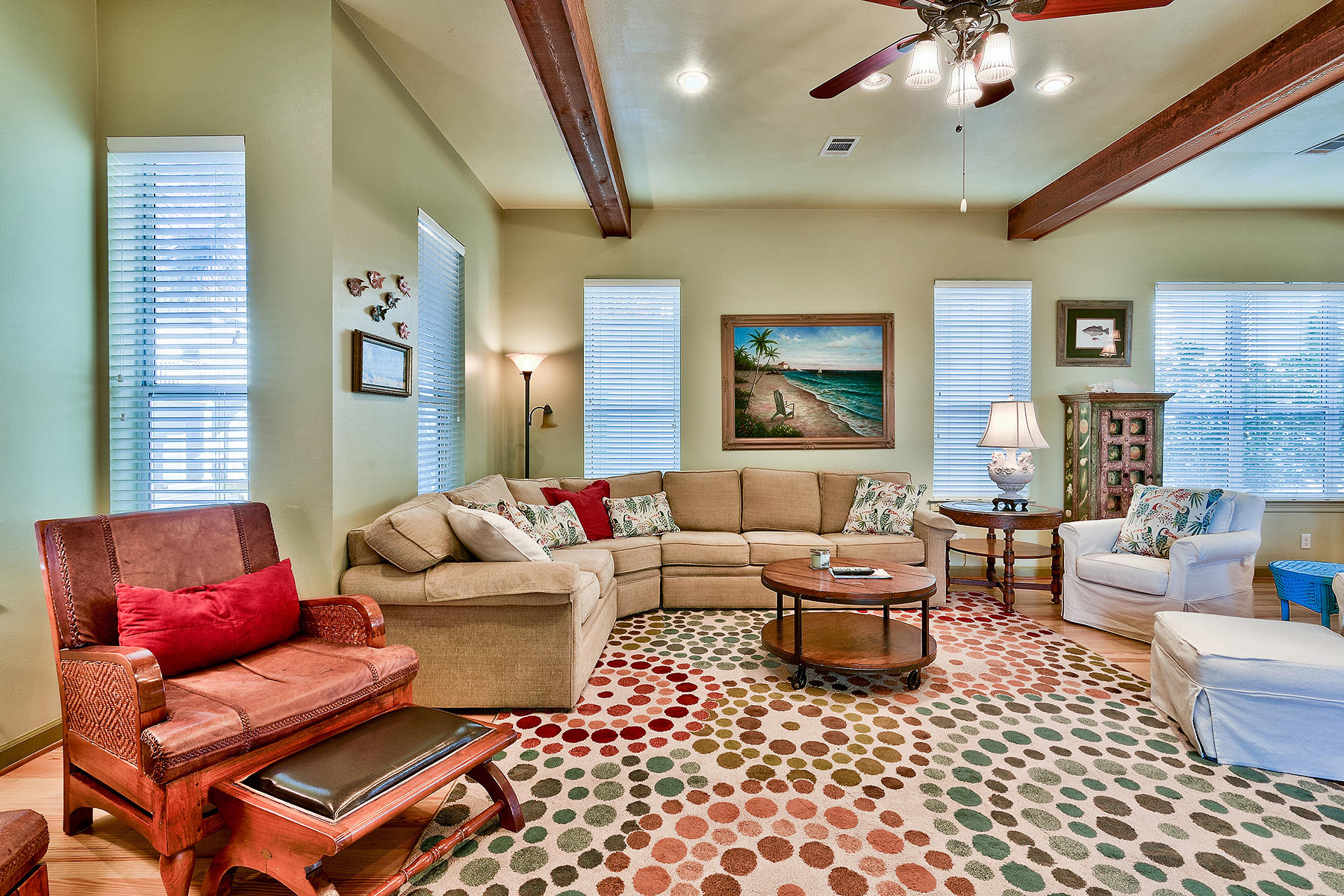 49 Cottage Street Santa Rosa Beach, FL 32459 - Photo 6 of 27 a living room with furniture and a chandelier