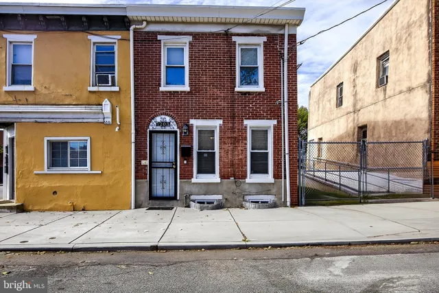 a brick building with a large windows