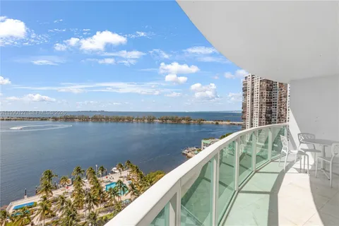 a view of a balcony with an ocean view