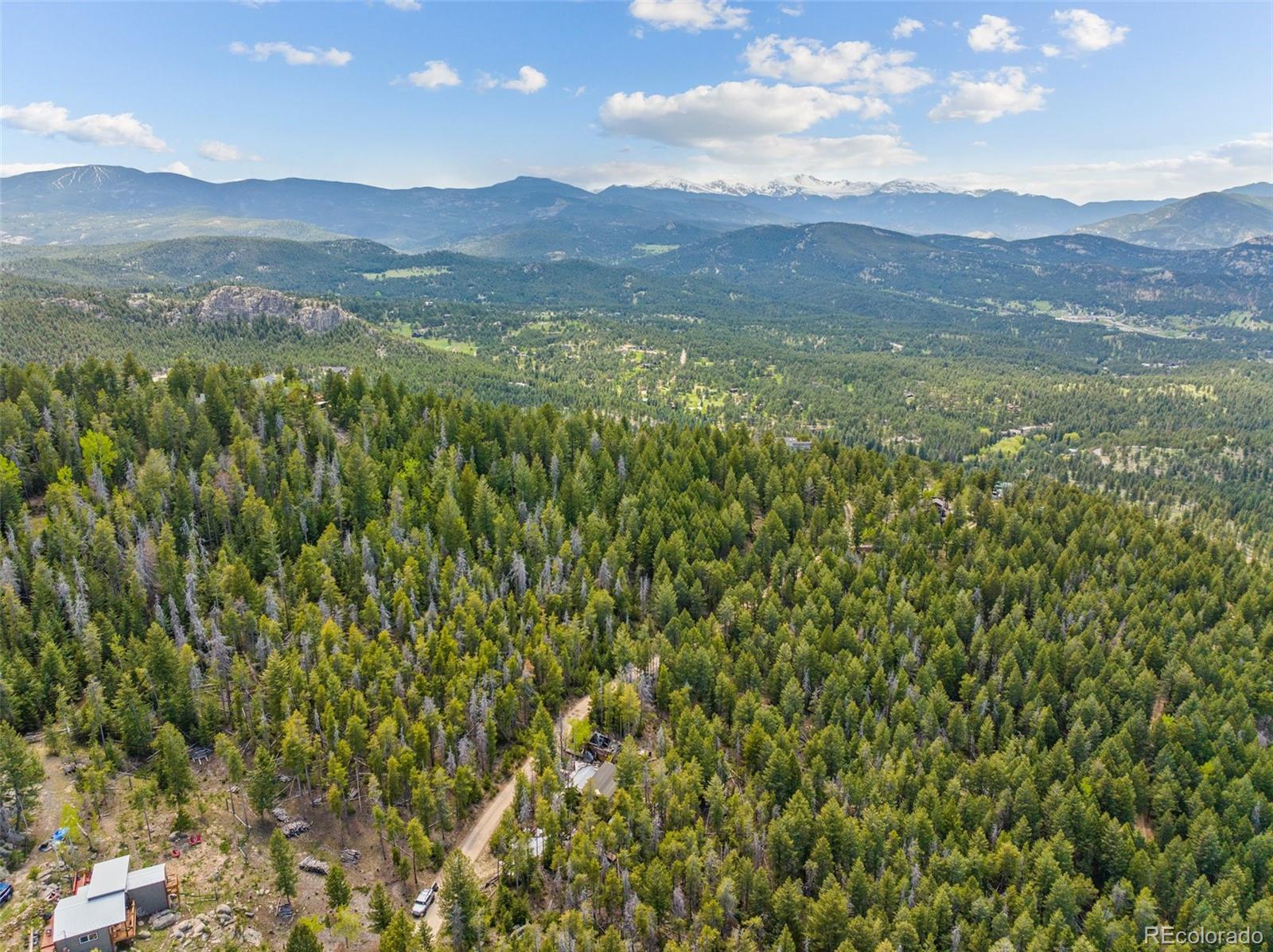 Lost Cabin Trail Evergreen, CO 80439 - Photo 16 of 17 a view of mountain view with mountains in the background