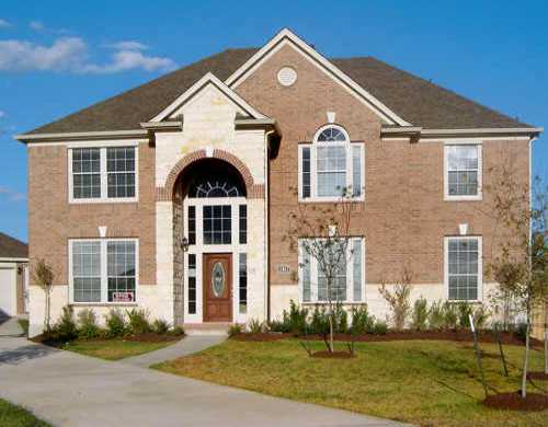 11417 Runnel Ridge Road Manor, TX 78653 - Photo 1 of 1 a front view of a house with a yard