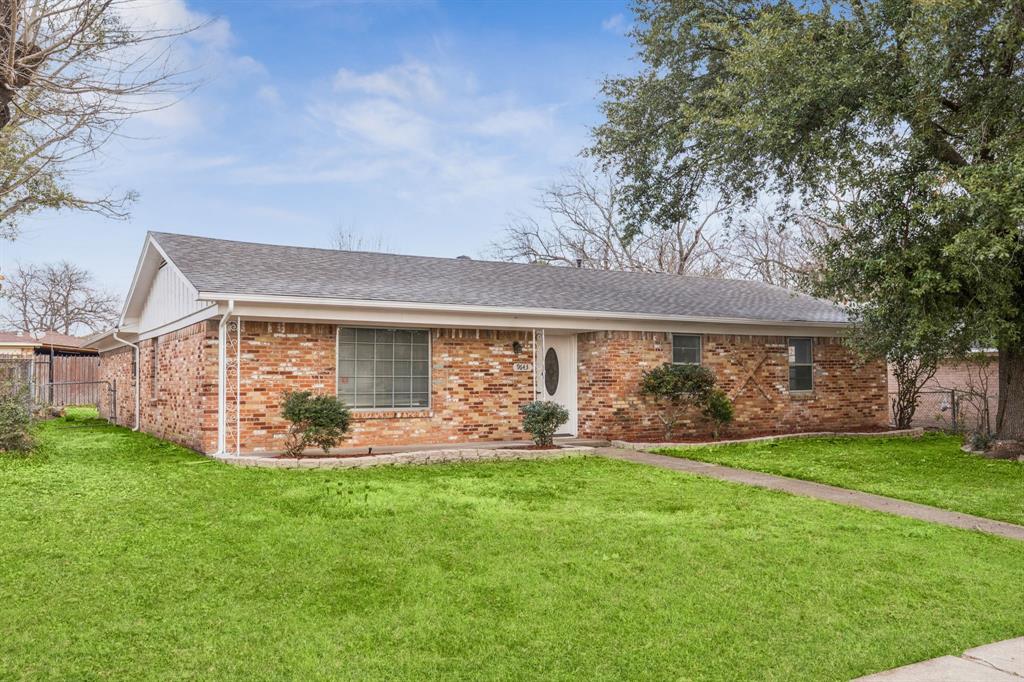 9643 Altacrest Drive Dallas, TX 75227 - Photo 1 of 30 front view of a house with a yard