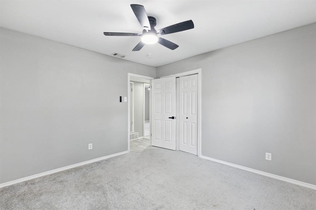 9643 Altacrest Drive Dallas, TX 75227 - Photo 19 of 30 a view of an empty room