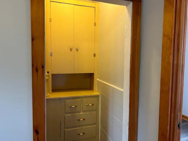 a view of balcony with furniture