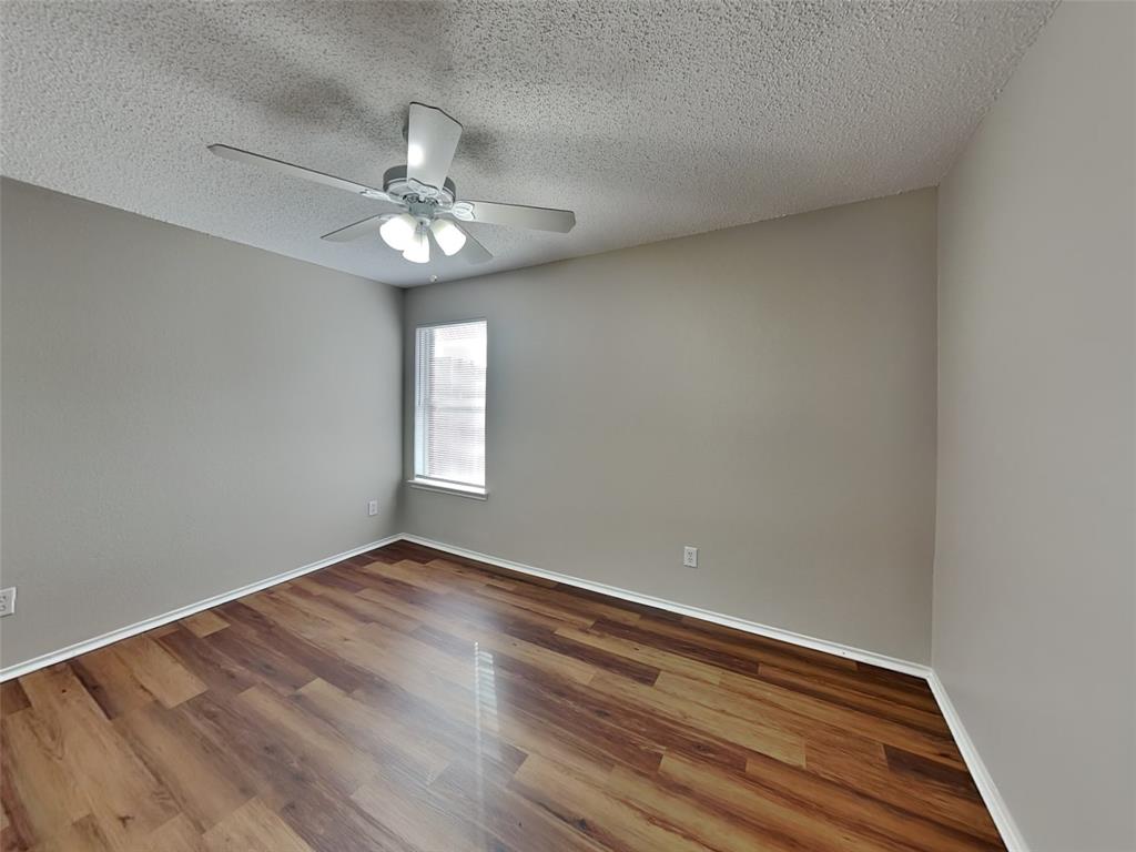 7413 Ranger Way Fort Worth, TX 76133 - Photo 15 of 19 wooden floor in an empty room