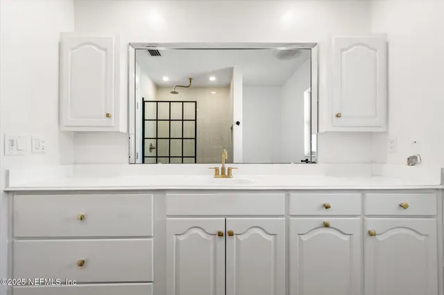 a view of empty room with windows