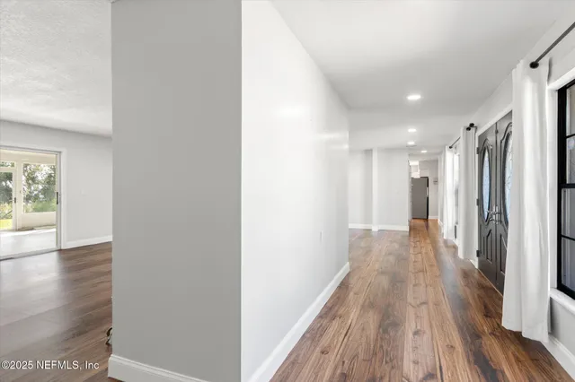 a view of an empty room with window