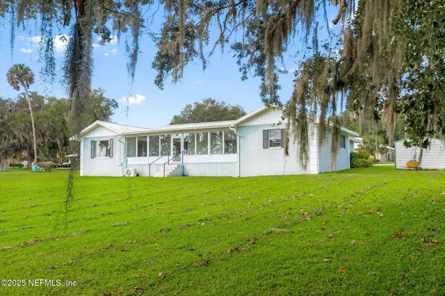 front view of house with a yard