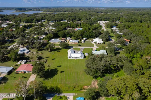 a view of a street with a building in the background